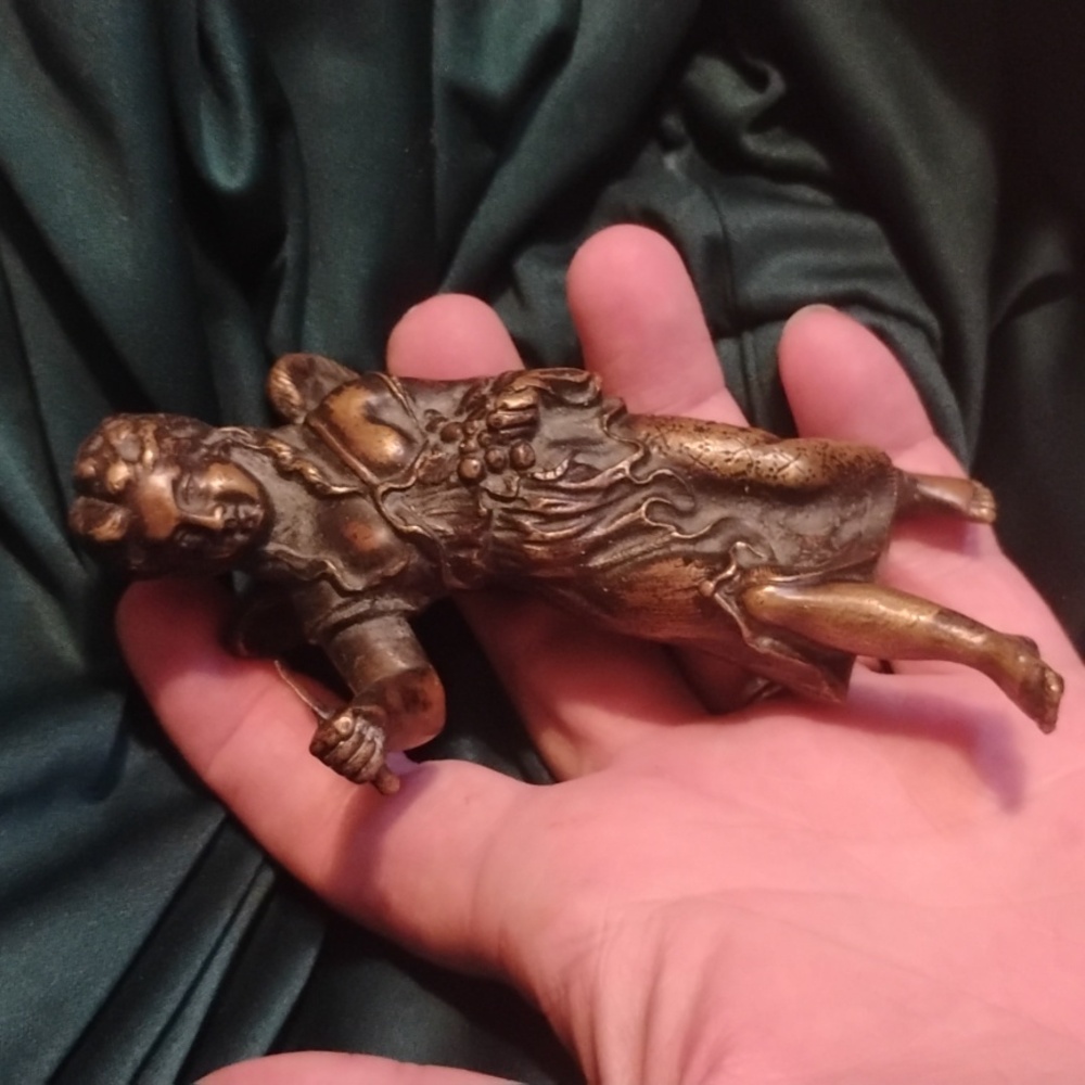 Vintage brass angle with knife